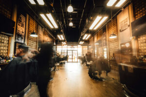 Barber chair in urban Orlando barbershop surrounded by street art and creative tools